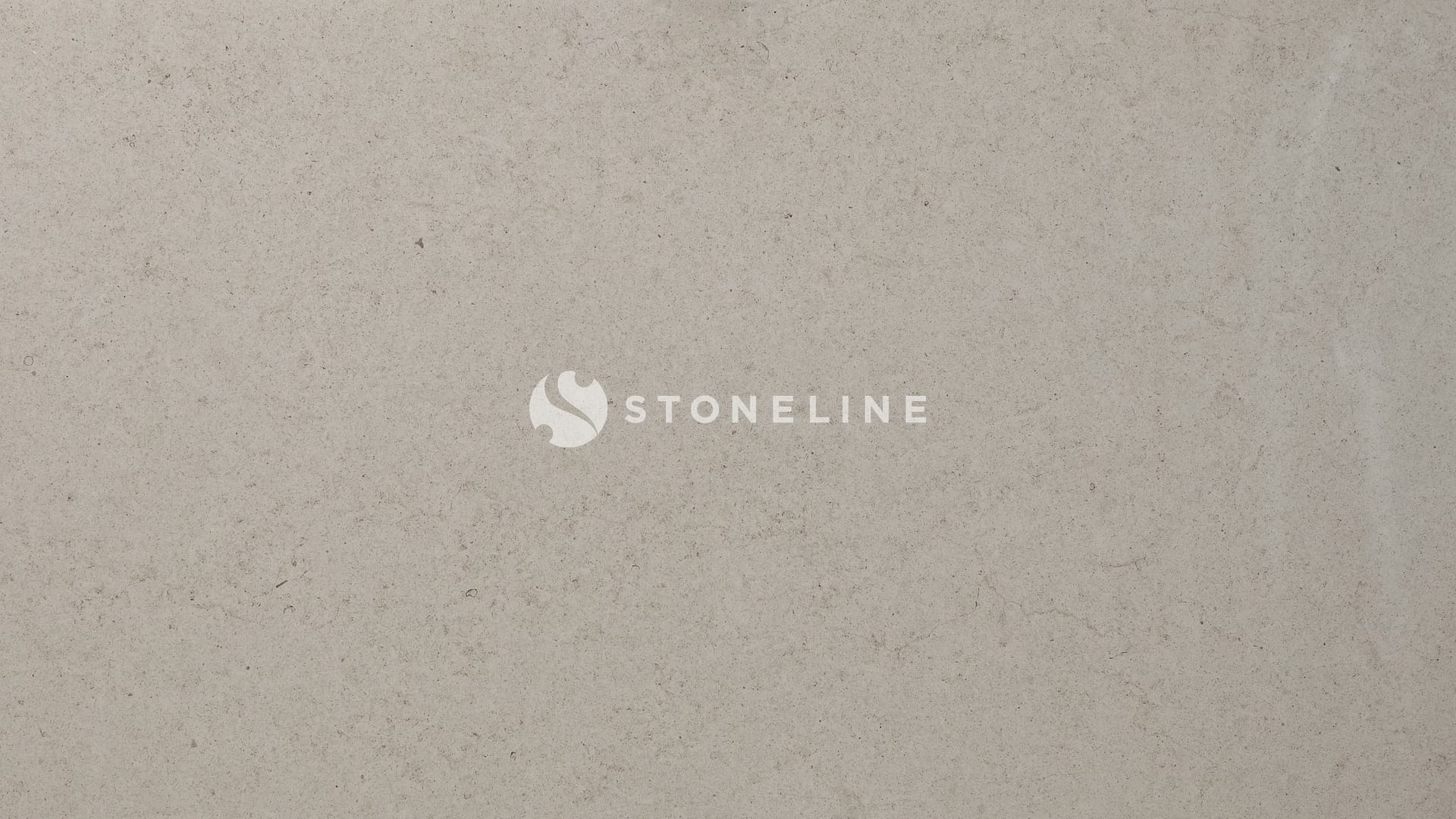 Close-up of light gray textured concrete surface.