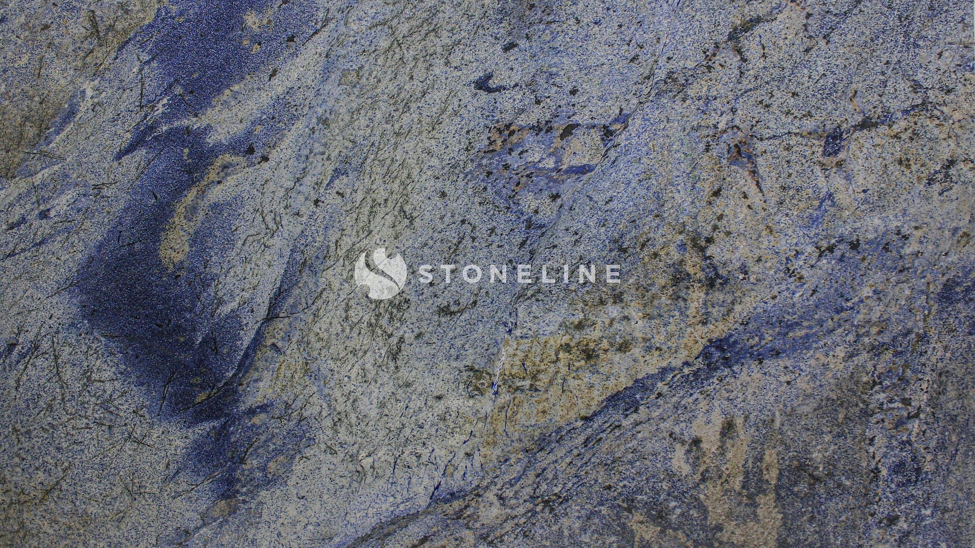 Close-up of textured blue and gray granite surface.