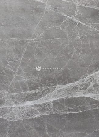 Gray marble texture with white veining pattern.