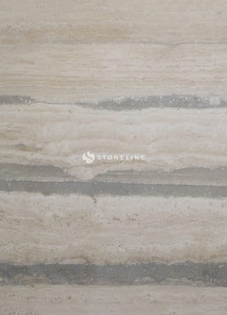 Beige marble surface with horizontal striations.