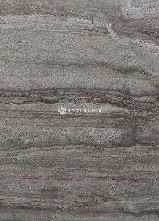 Gray textured stone surface with layered patterns.