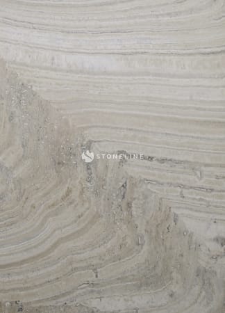Close-up of beige stone texture with lines
