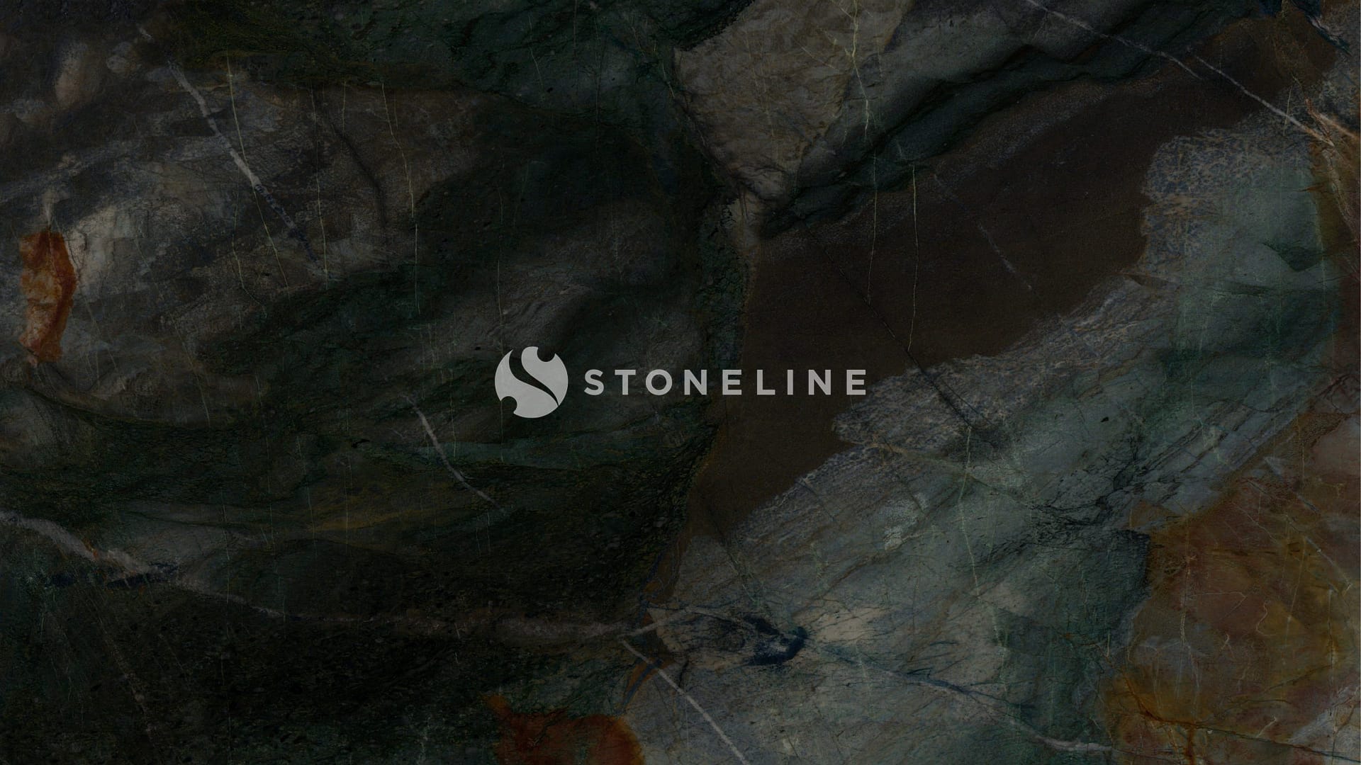 Dark textured stone surface with earthy hues