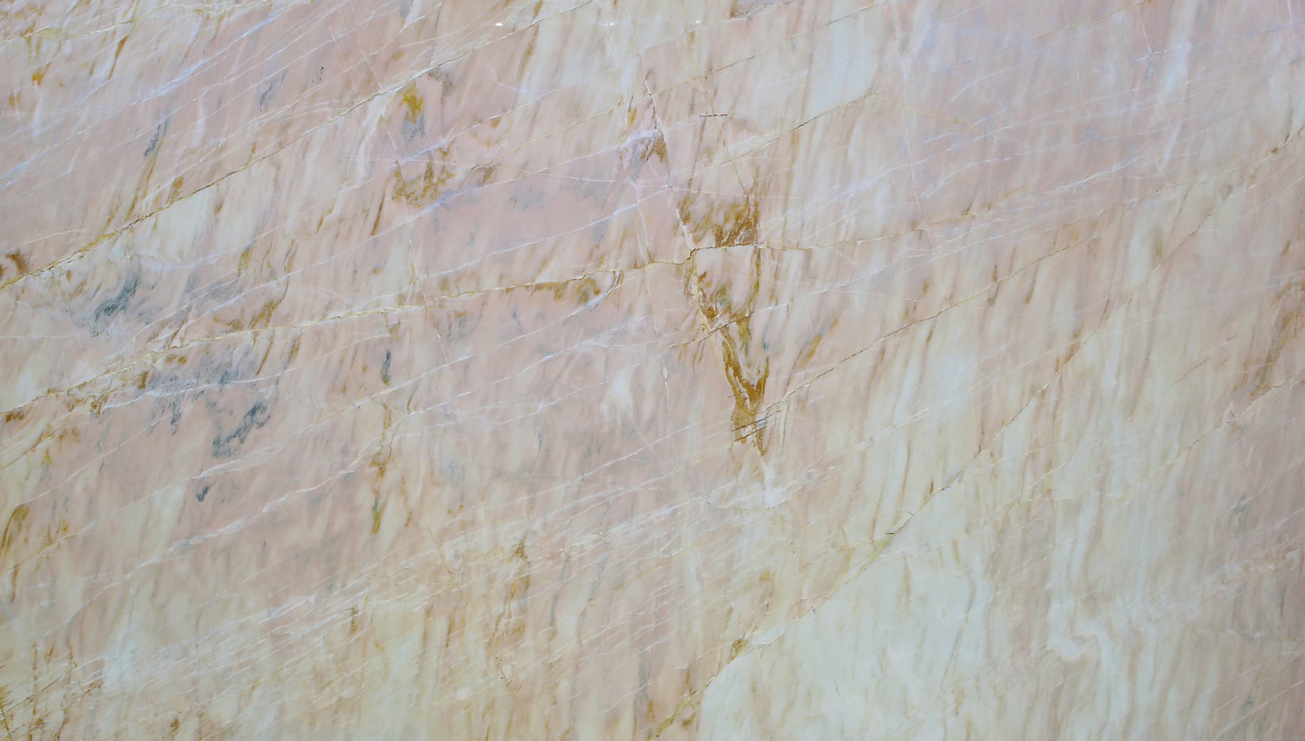 Close-up of beige marble texture with veins