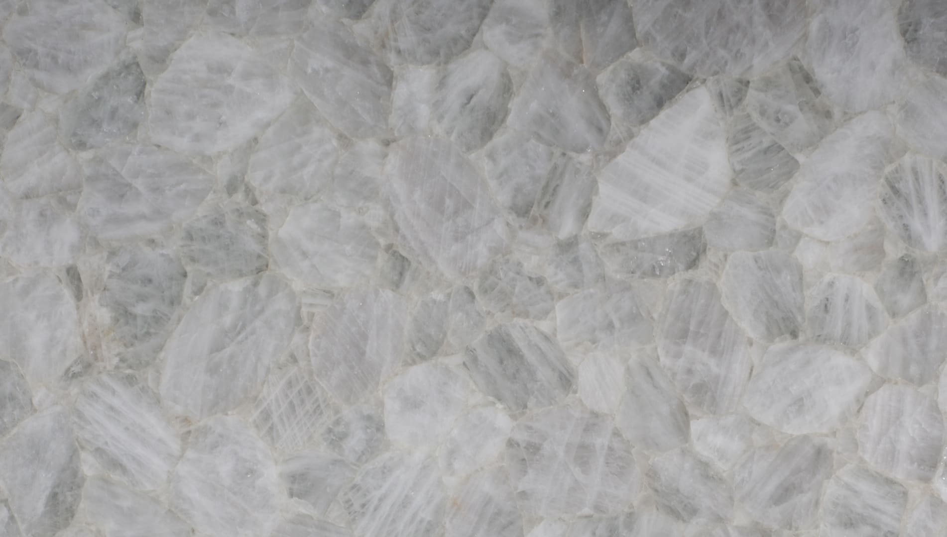 Close-up of white mineral stone texture background.