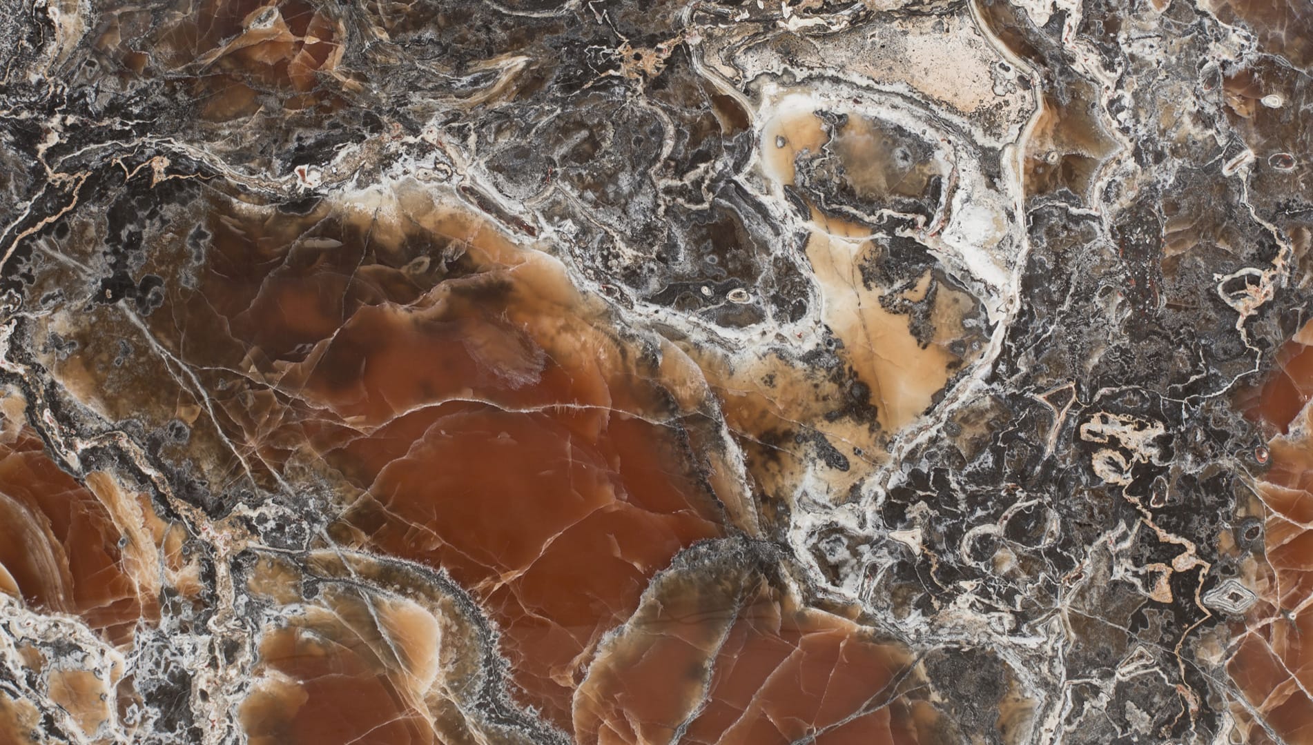 Close-up of brown and black marble texture.