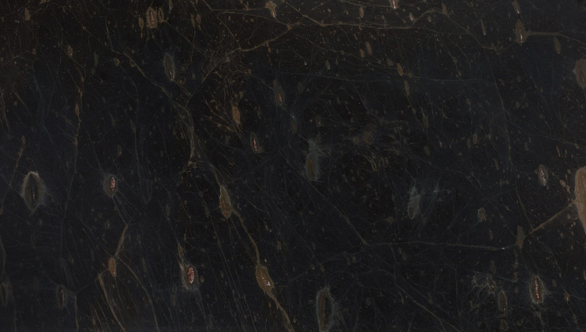 Close-up of dark textured marble surface.