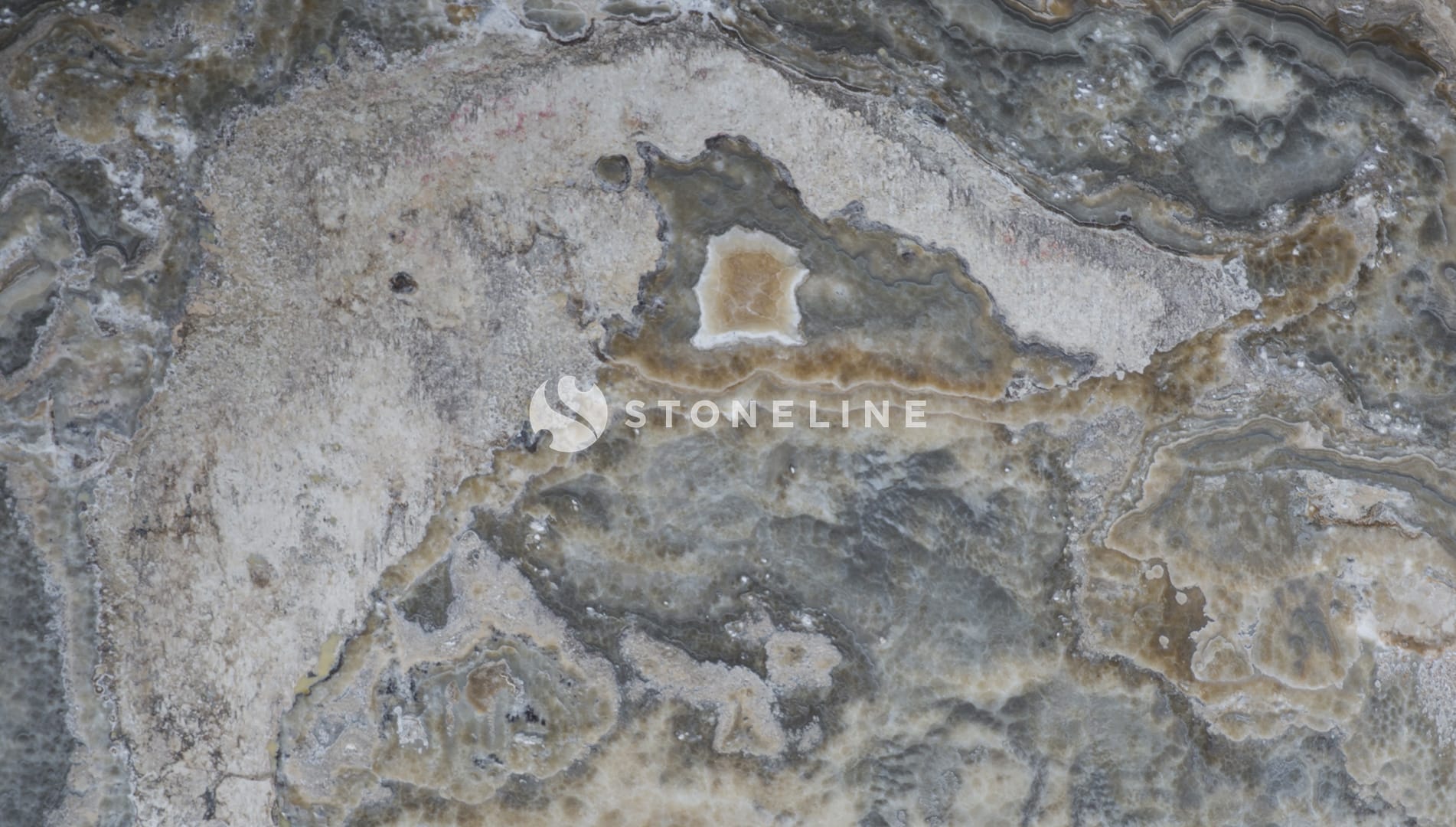 Close-up of textured gray and brown stone surface.