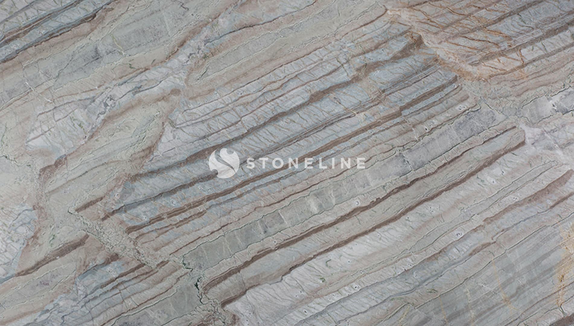 Aerial view of striped geological formations.