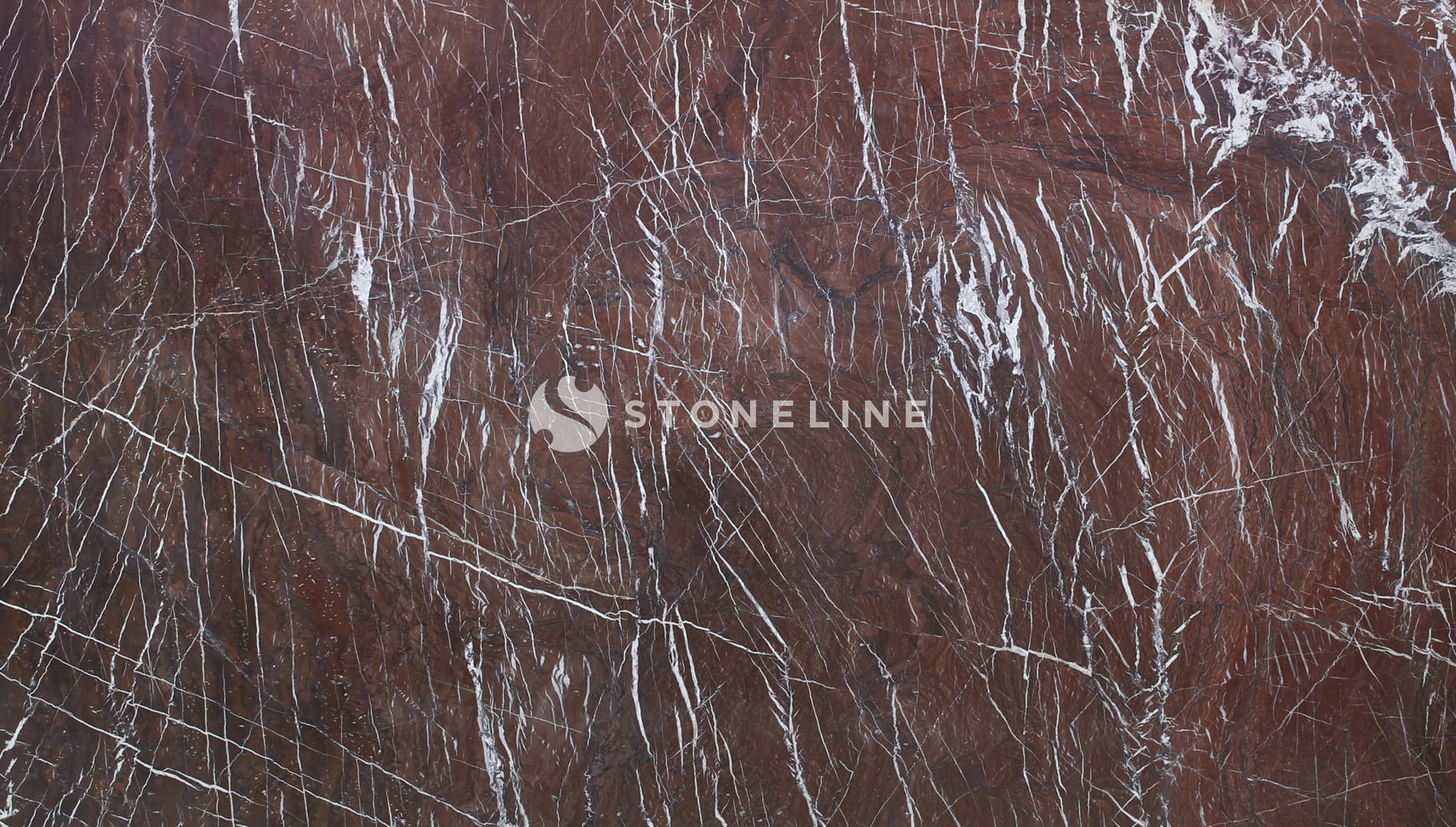 Brown marble slab with white veins texture.