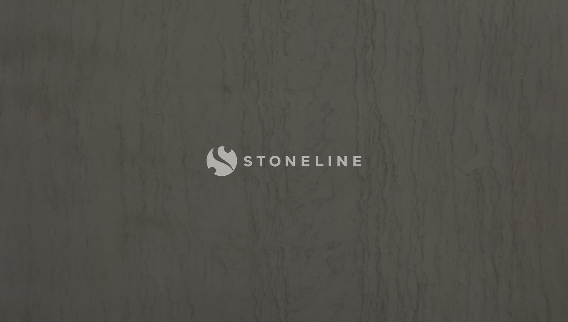 Dark textured stone surface background.