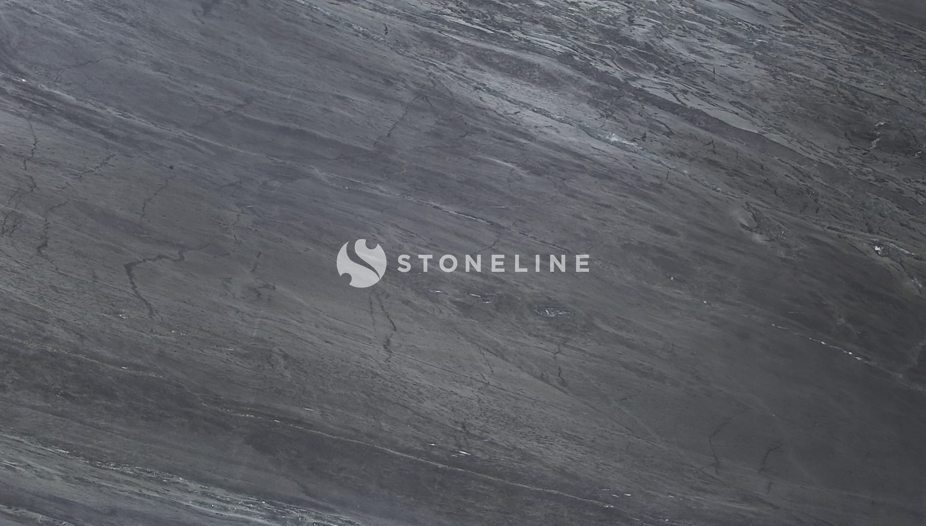 Close-up of dark textured stone surface