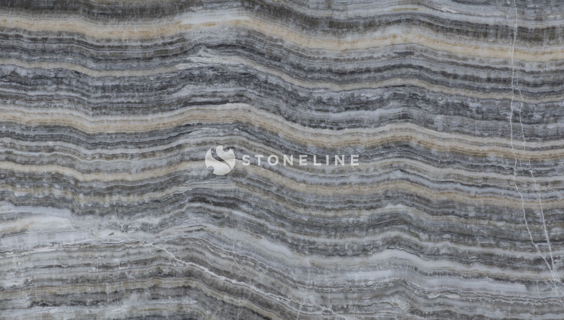 Patterned brown and gray stone surface texture.