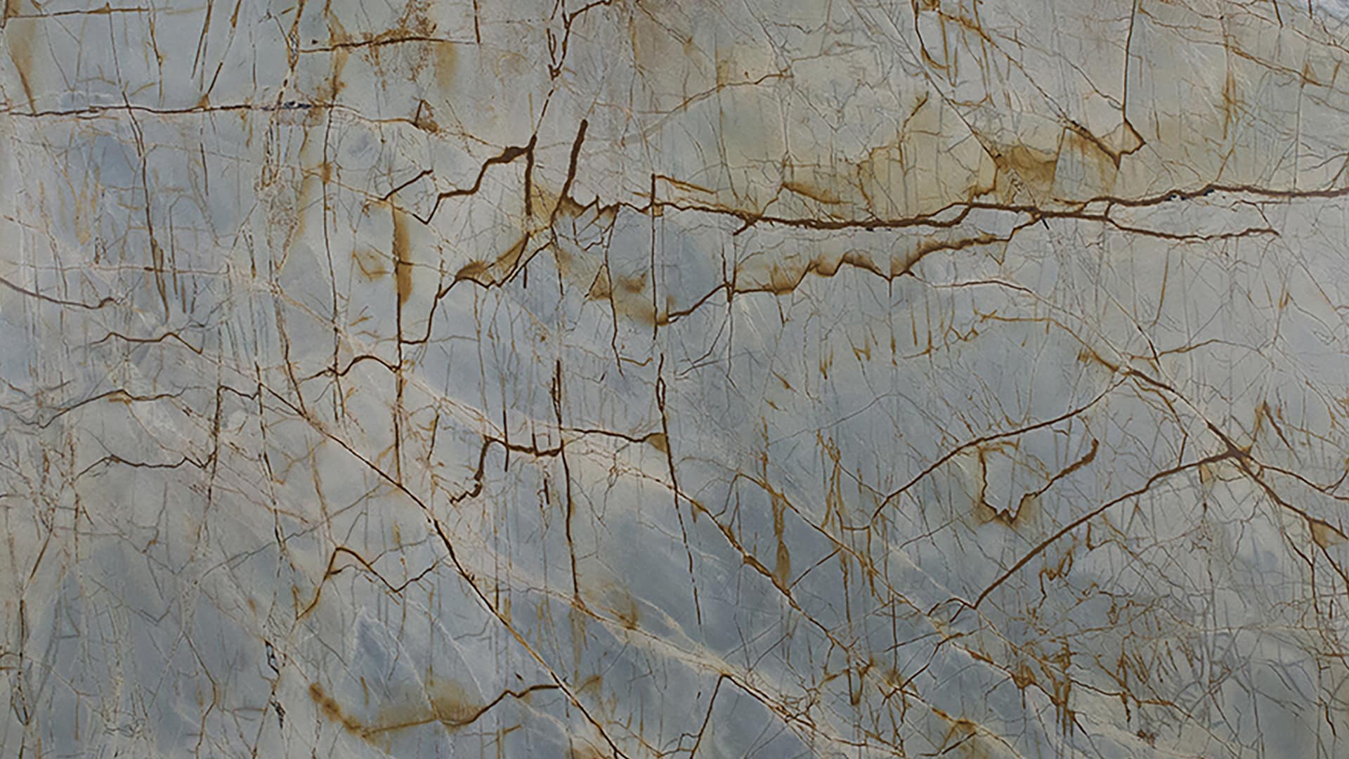 Marble texture with brown veins and blue tones.