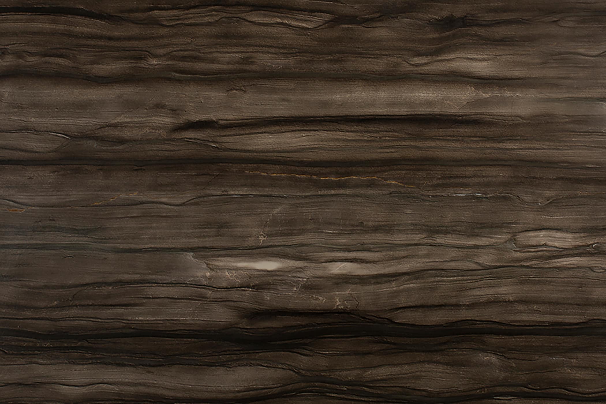 A close-up of dark brown textured wood grain.