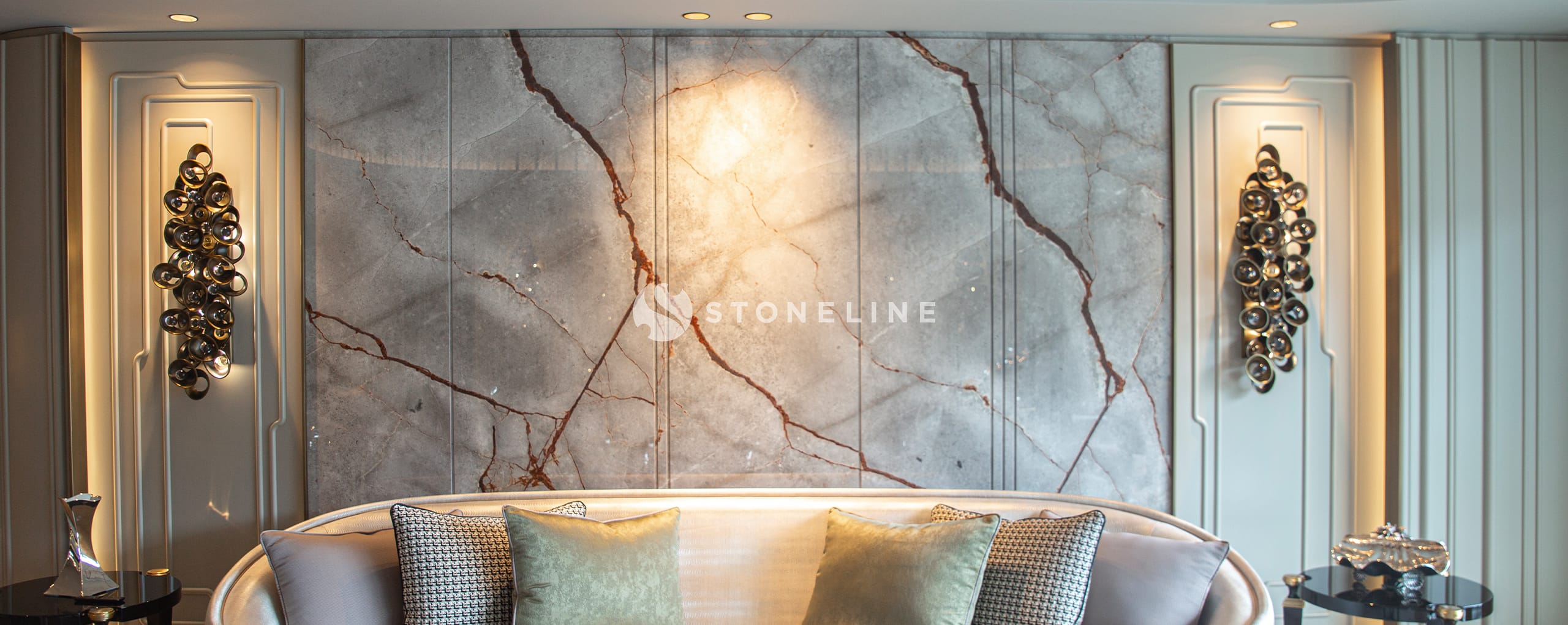 Elegant modern living room with marble wall design.