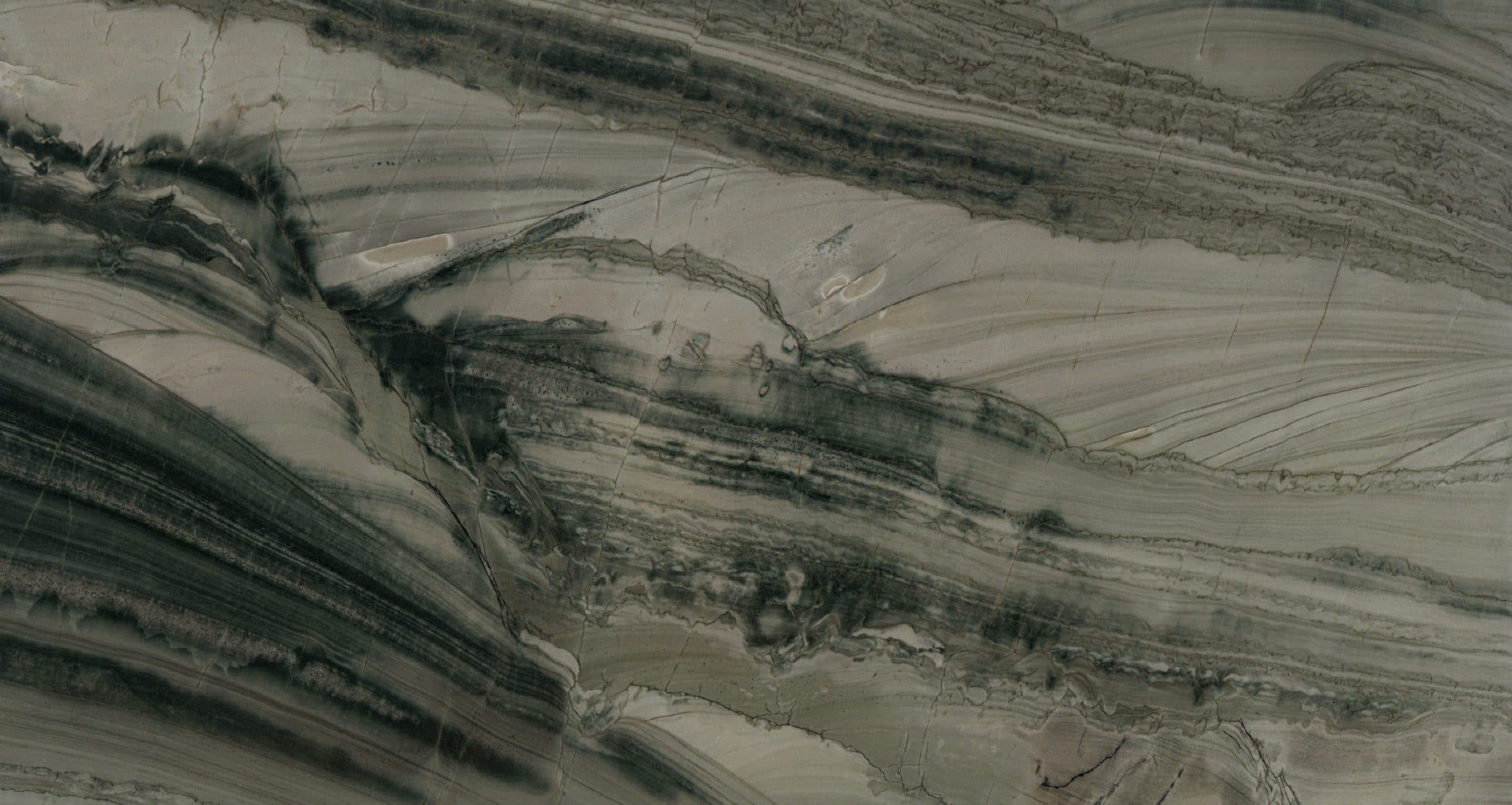 Close-up of gray and dark green marble texture.