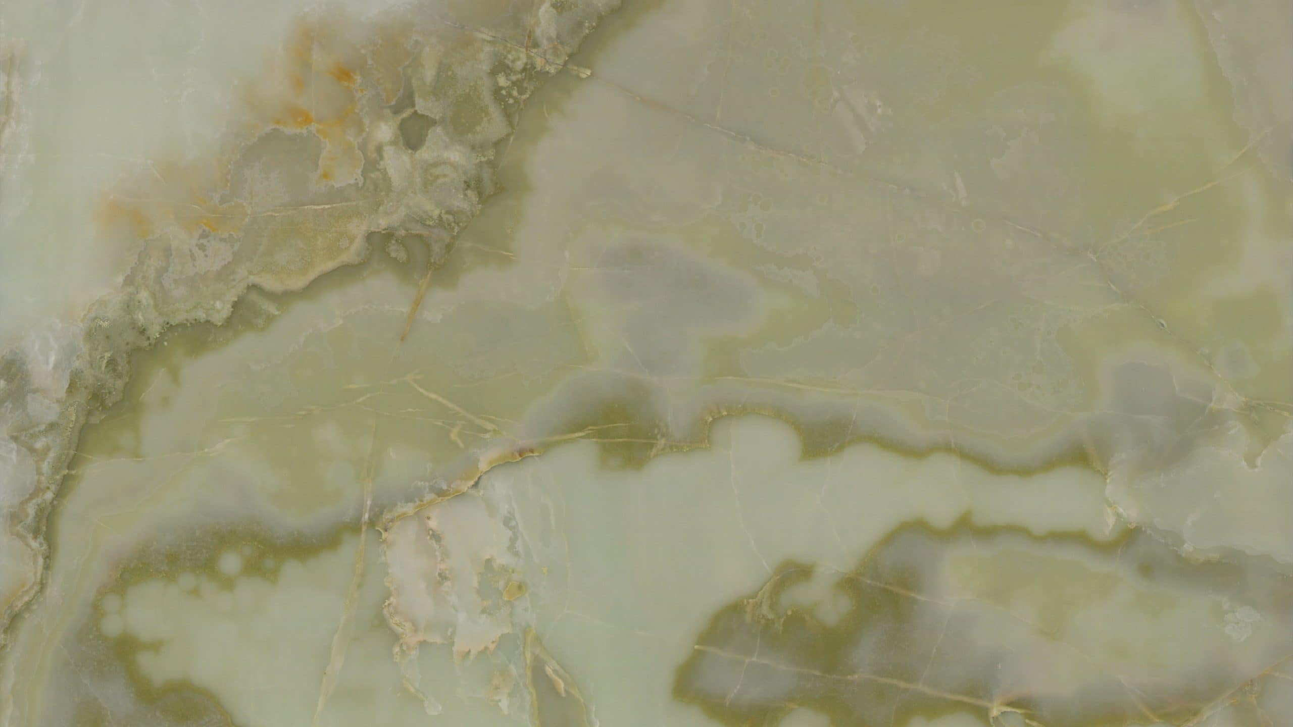Green and white marble texture close-up.
