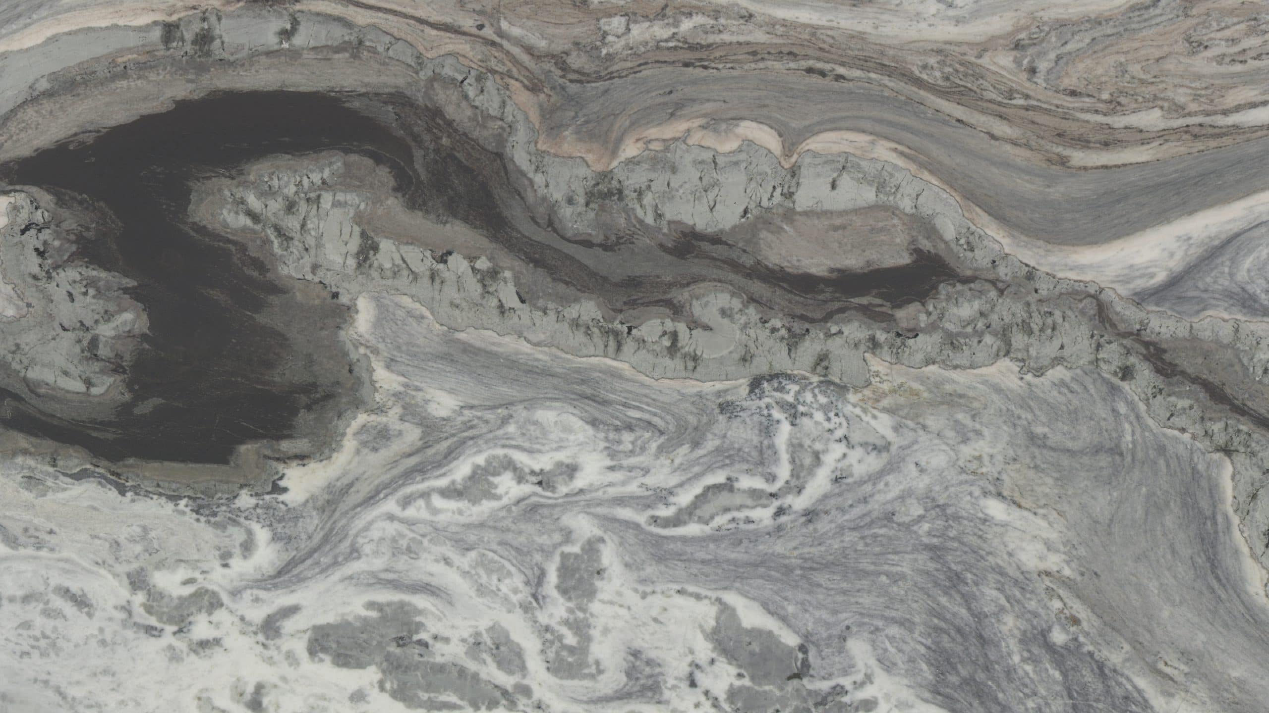 Gray and white marble texture with swirls.