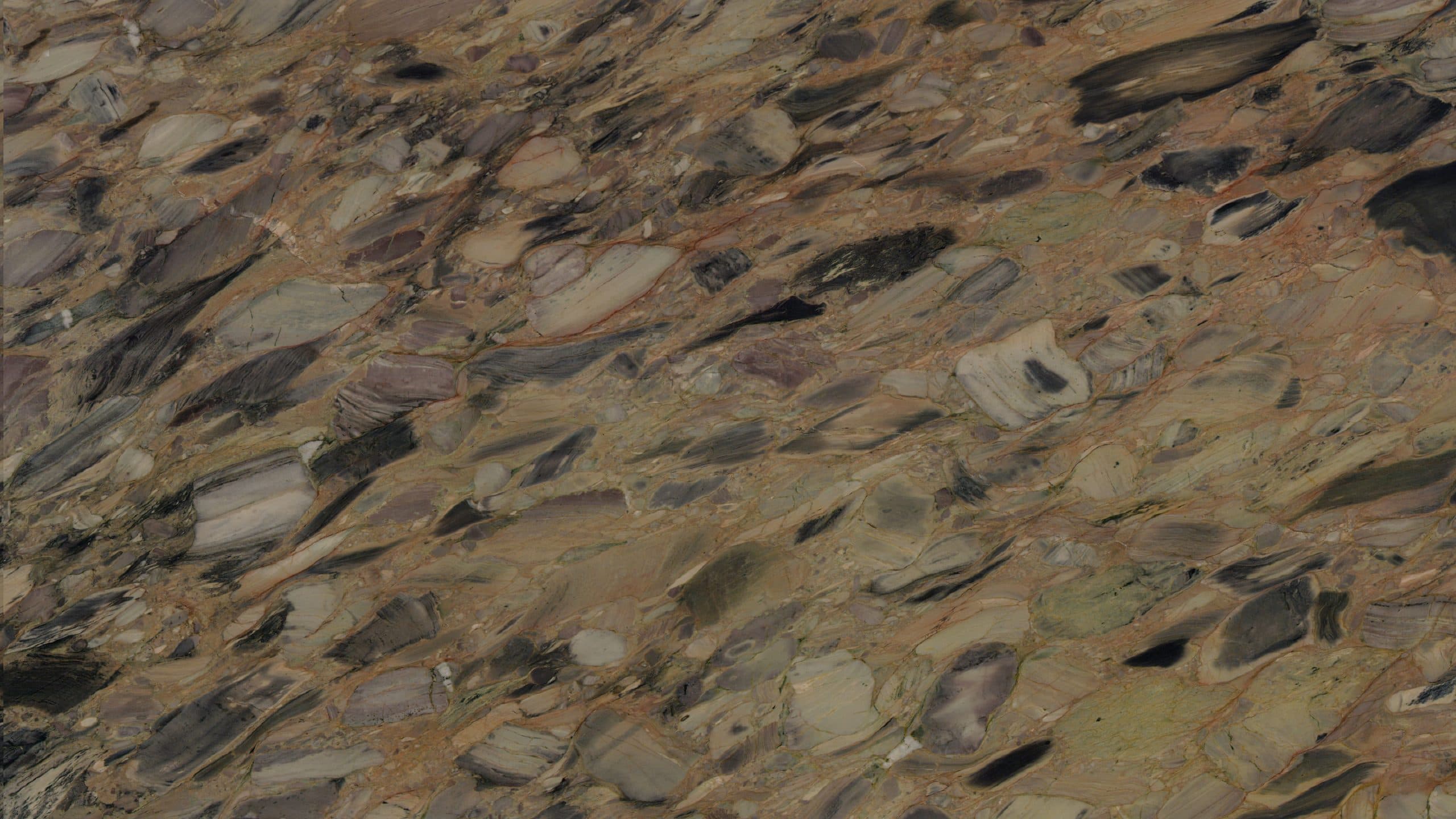 Close-up of textured stone surface with mixed colors.