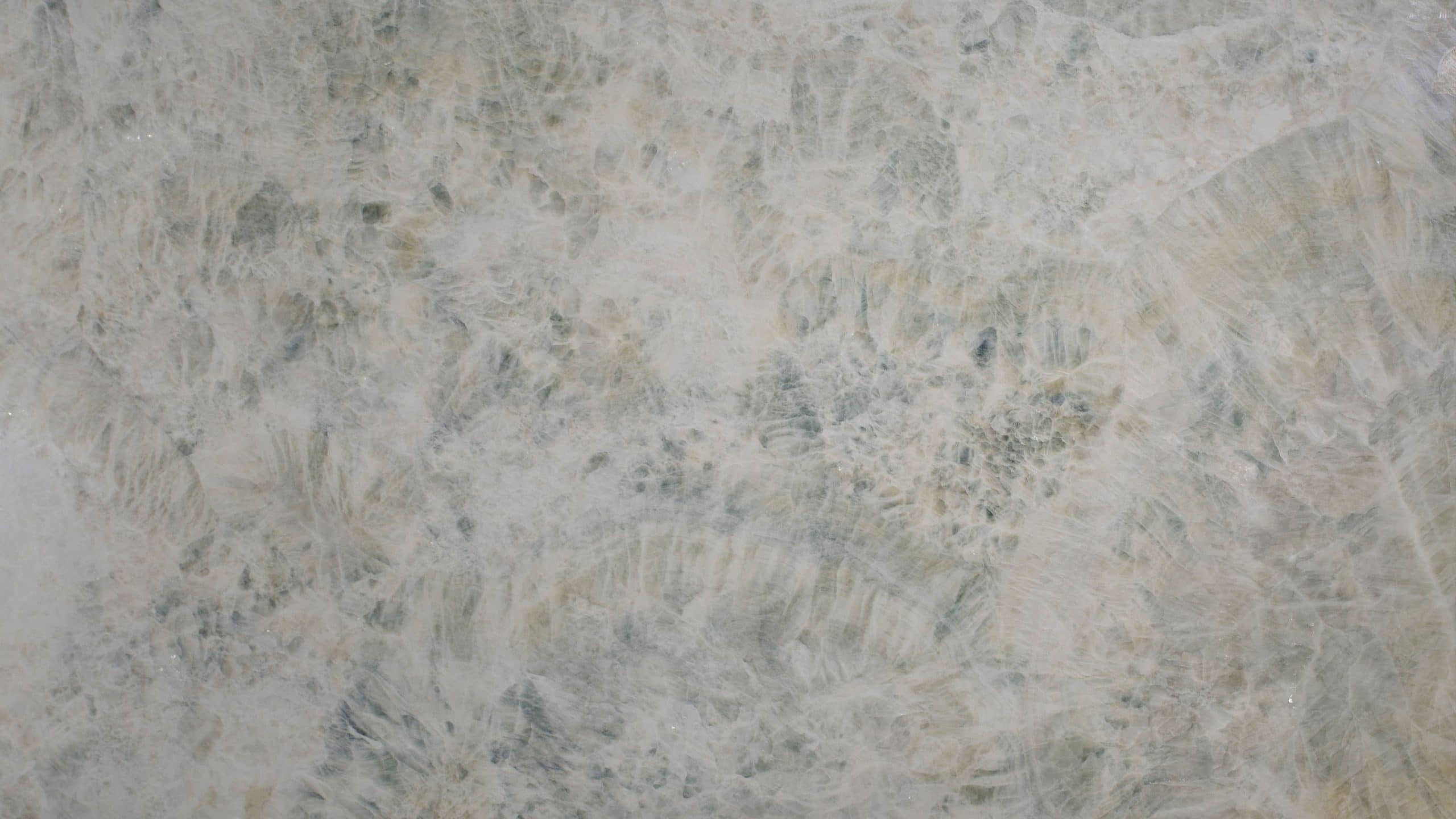 Close-up of polished marble texture with natural patterns.