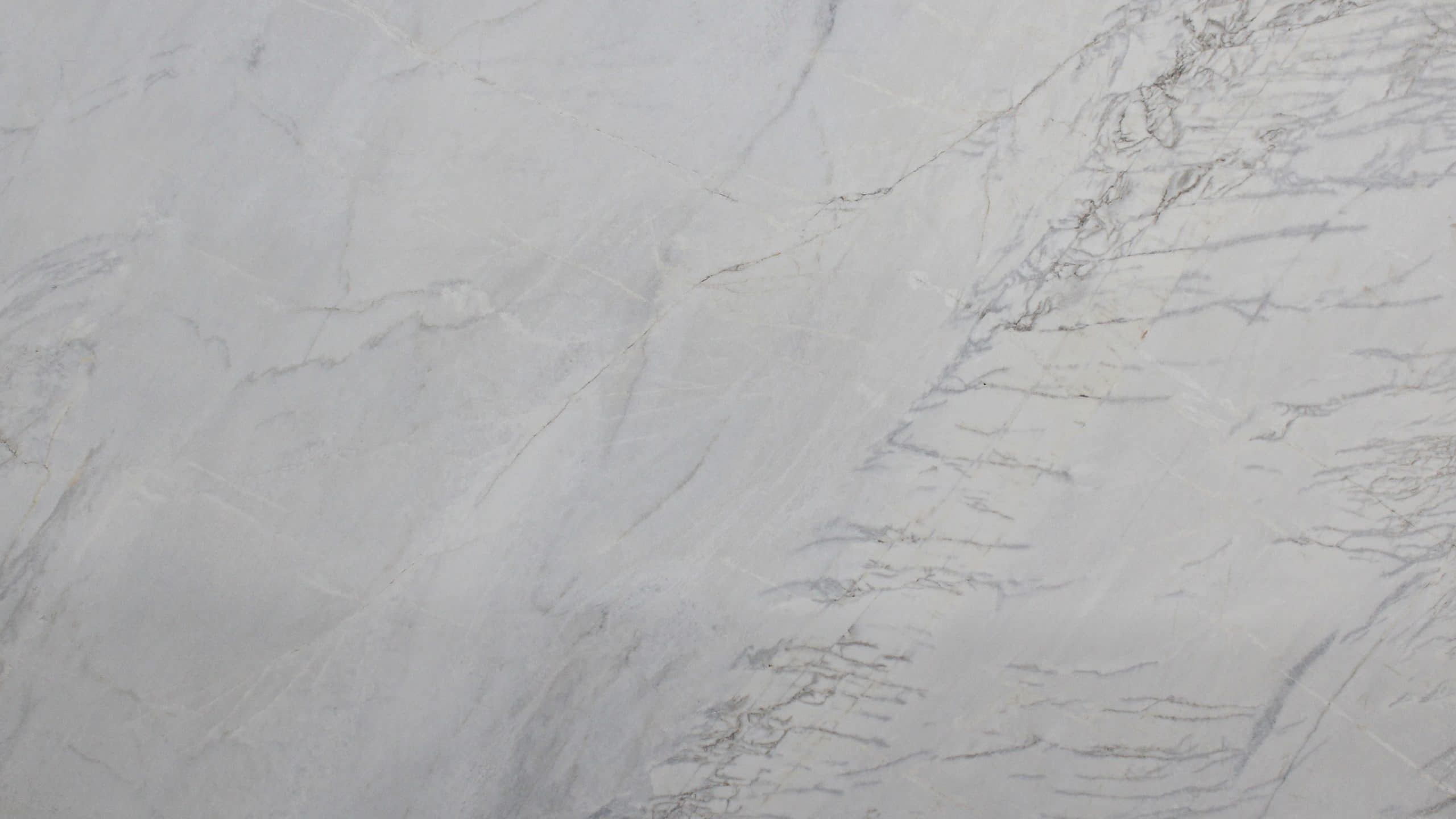 Light gray marble texture with natural veining.