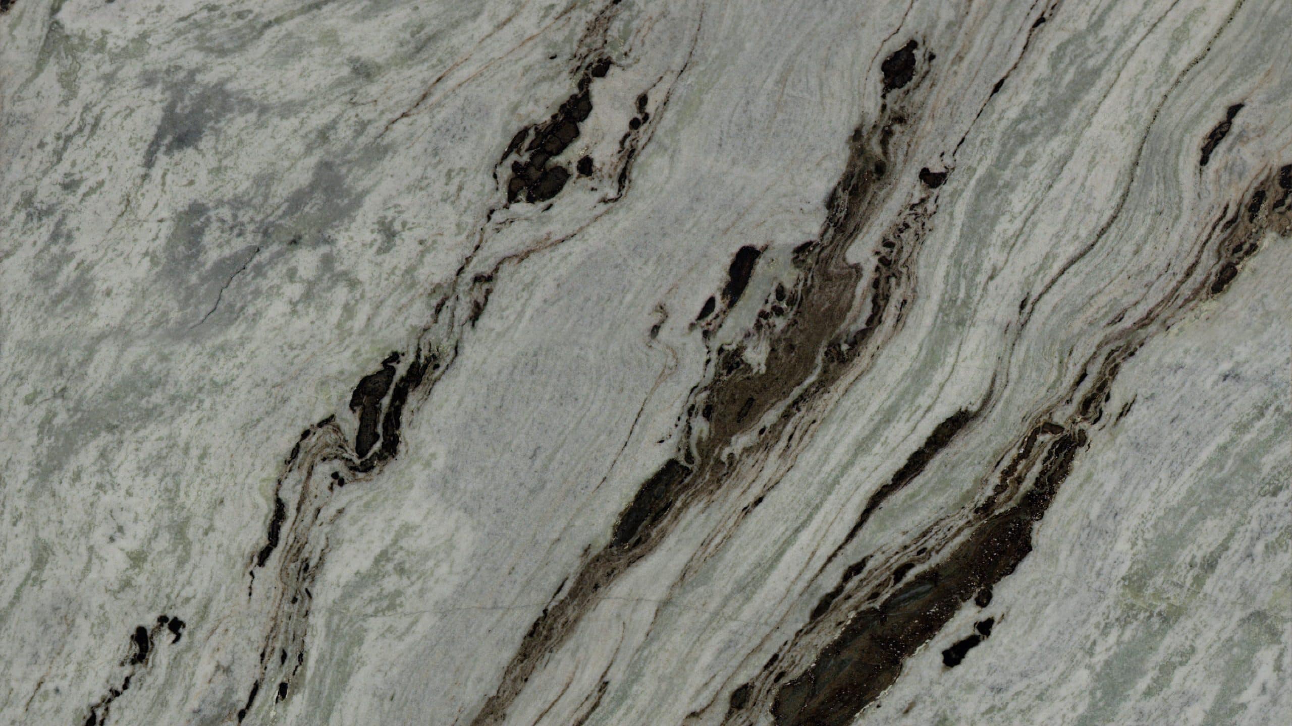 Close-up of textured marble surface with veins.