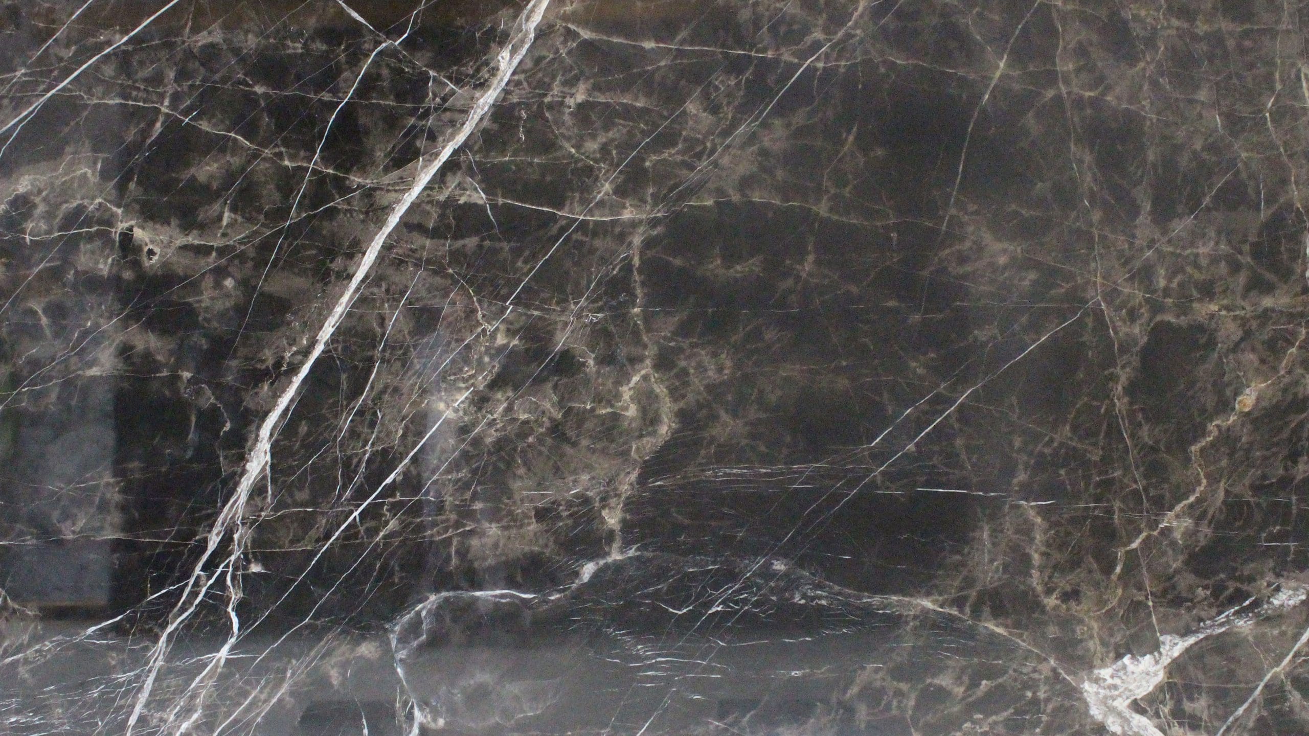 Dark marble texture with white veins