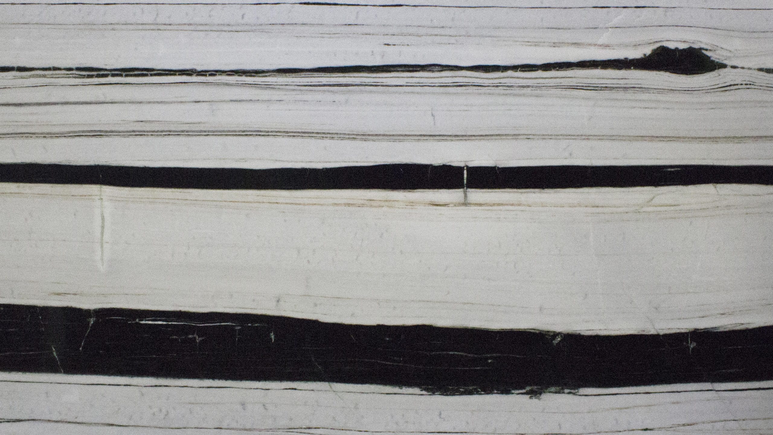 Black and white striped marble texture.
