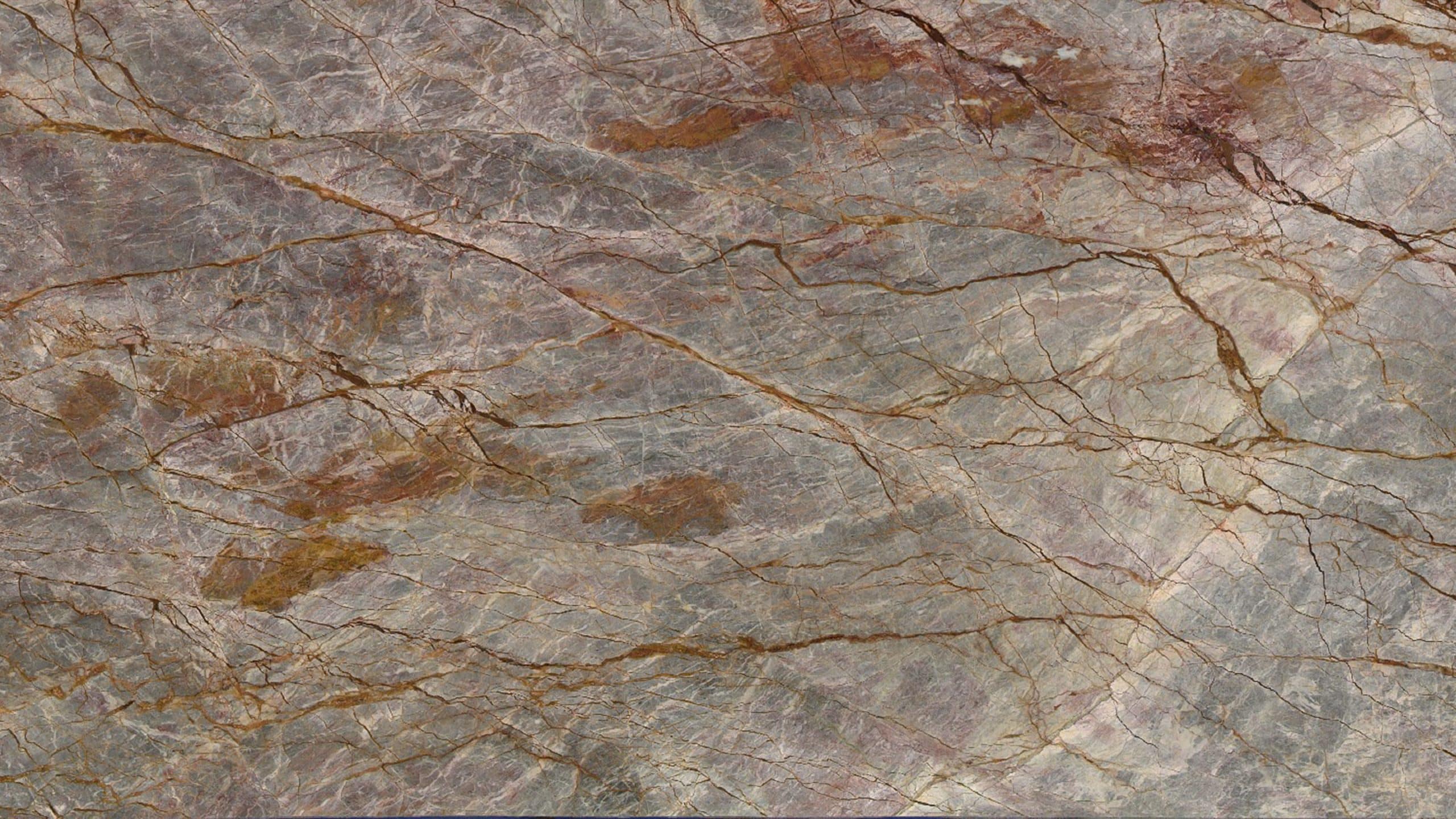 Marble texture with natural veins and patterns.