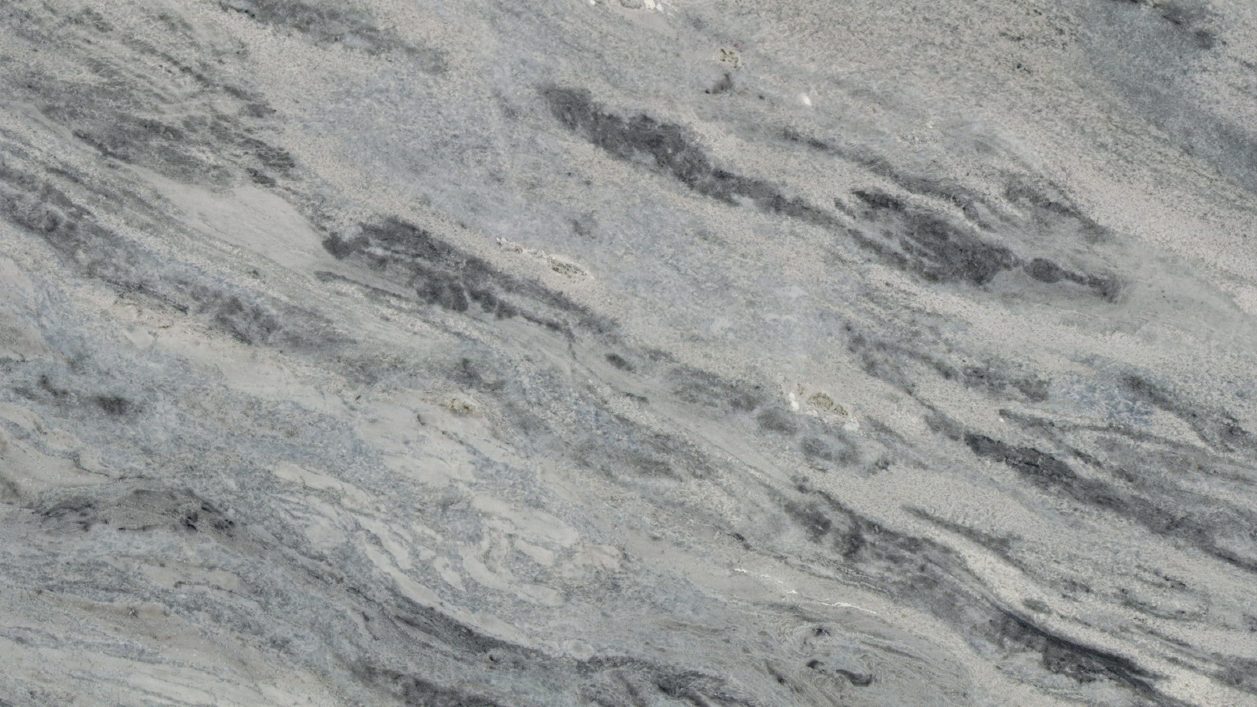 Close-up of textured gray marble surface.