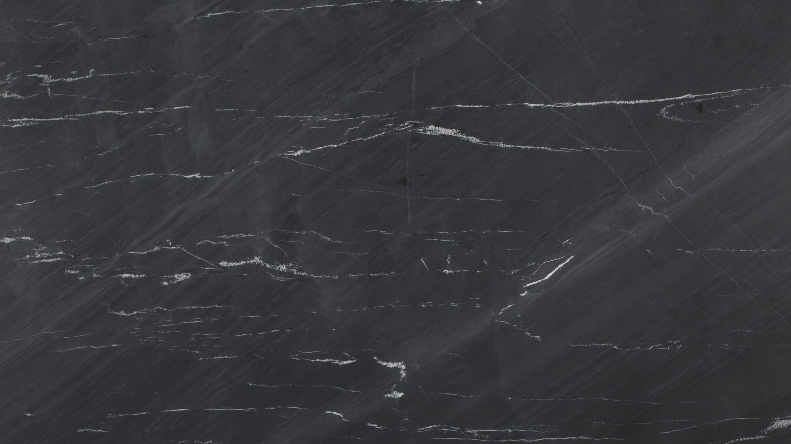 Dark marble texture with white veins
