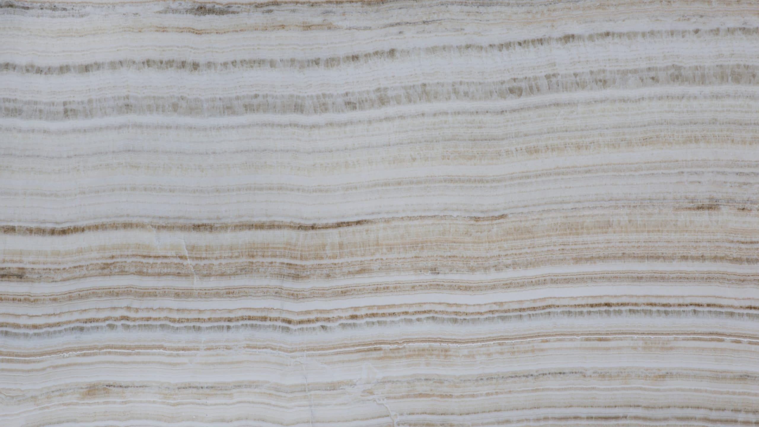 Close-up of beige and white marble texture.
