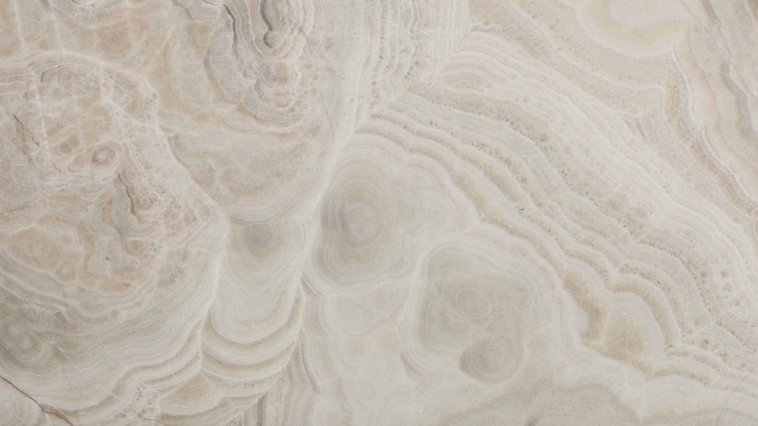 Marble texture with swirling patterns and colors.