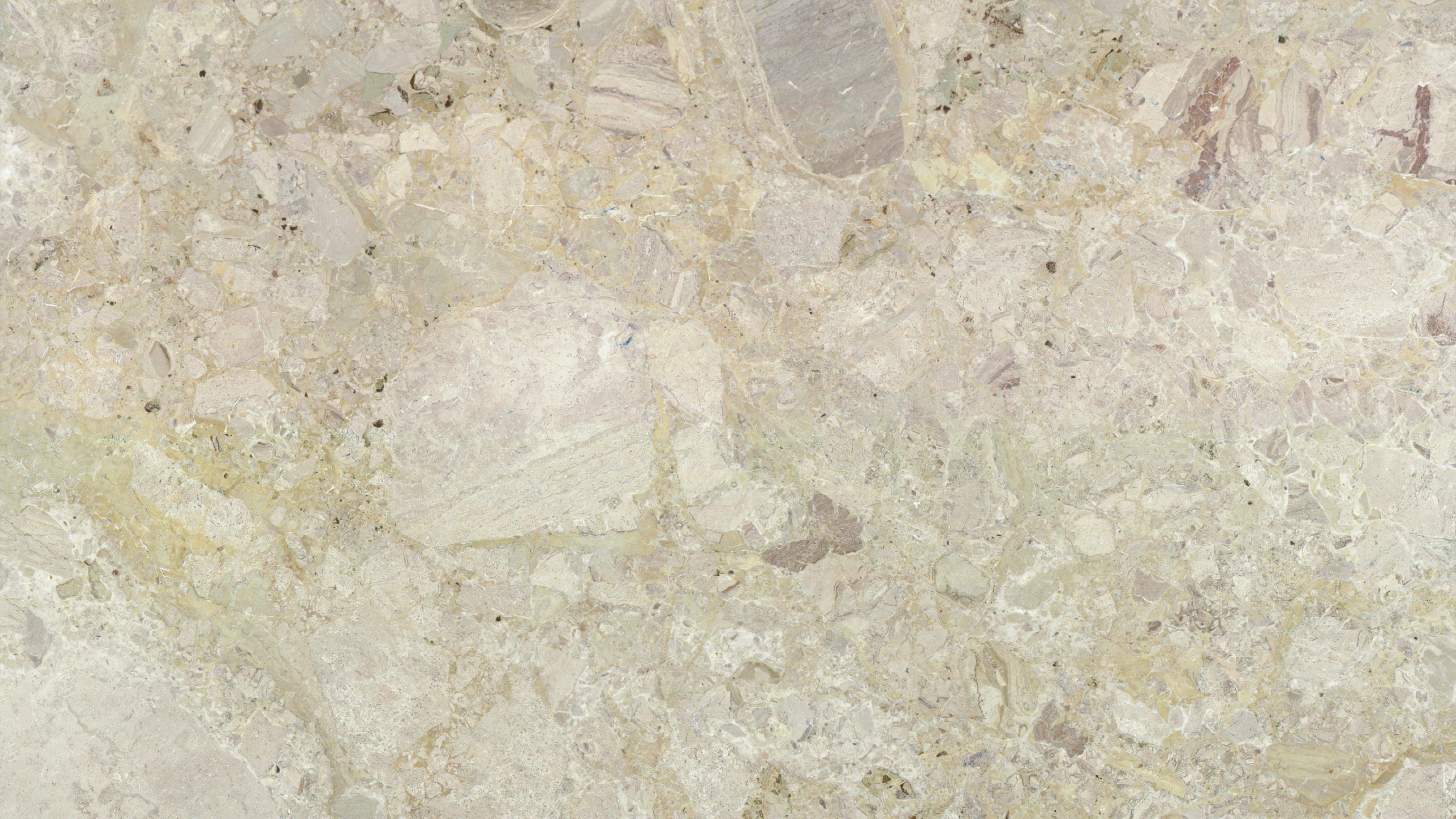 Close-up of light beige marble texture.