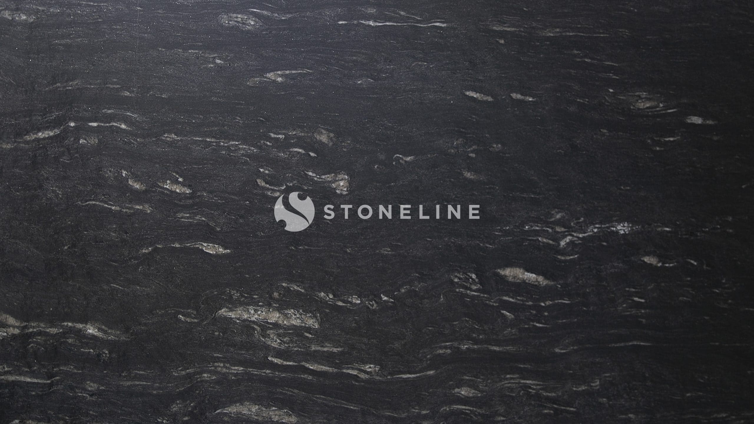 Dark textured stone background with subtle patterns