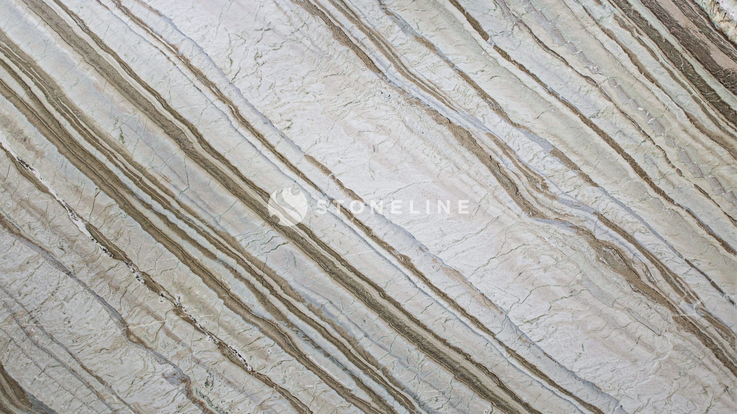 Close-up of textured stone surface with lines.