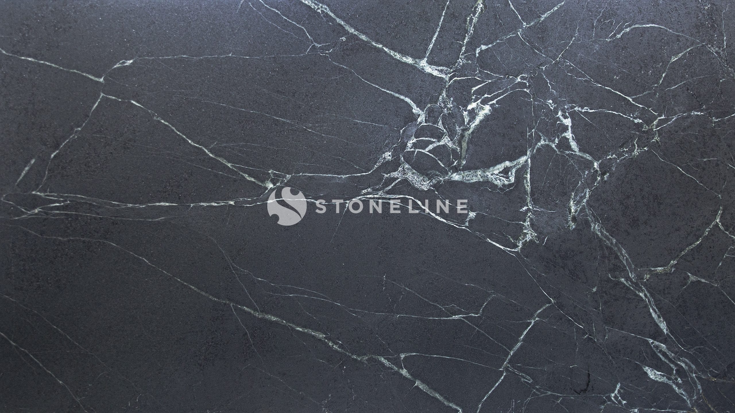 Dark gray marble texture with white veins.