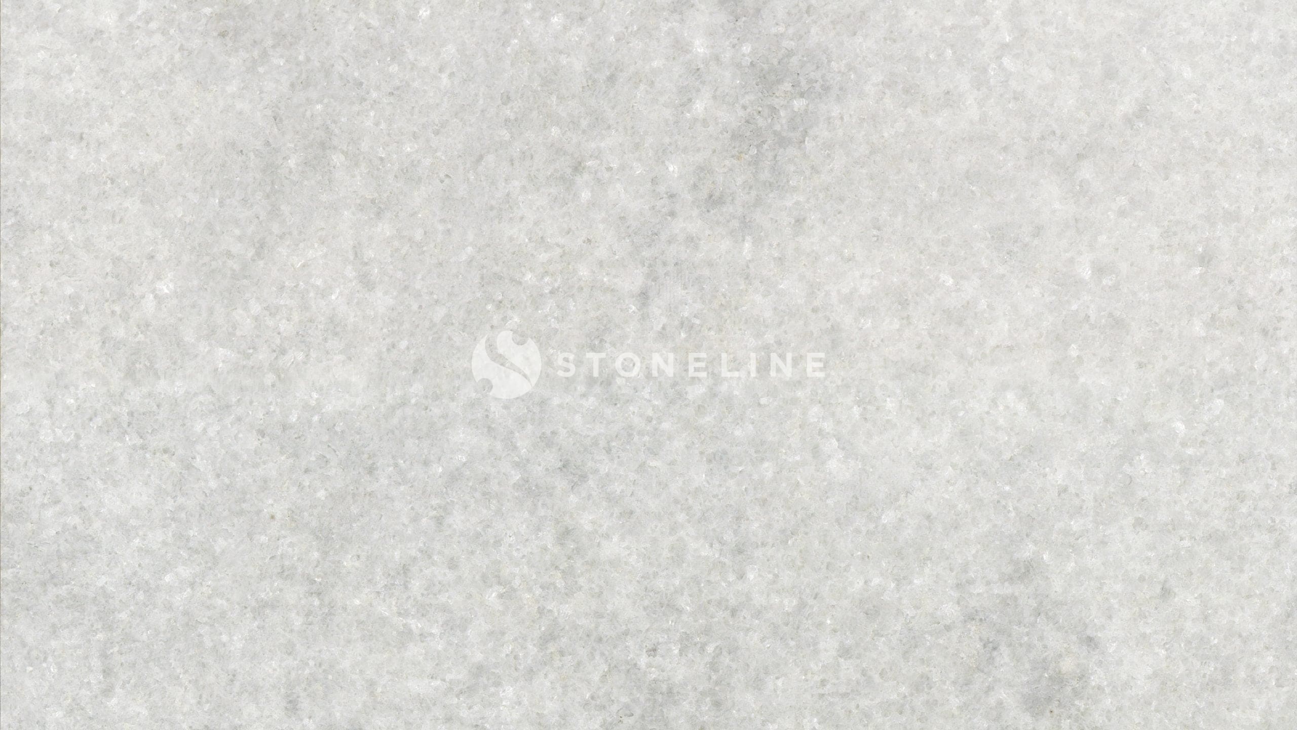 Close-up of white textured stone surface