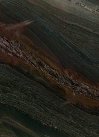 Dark green marble texture with brown veins.