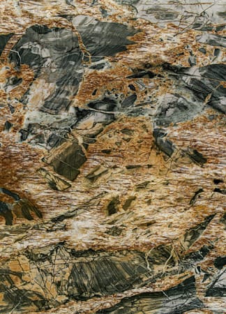 Detailed natural stone texture with earthy colors.