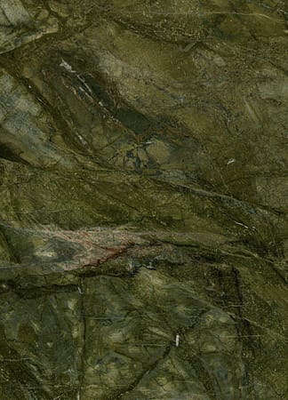 Close-up of textured green marble surface.
