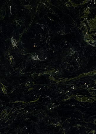 Dark green marble texture with swirling patterns