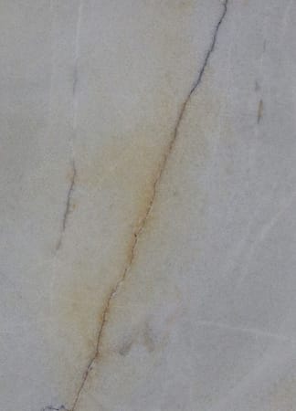 Close-up of beige marble texture with veins