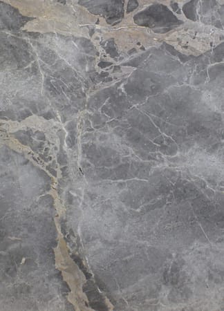 Close-up of gray marble texture with veins.