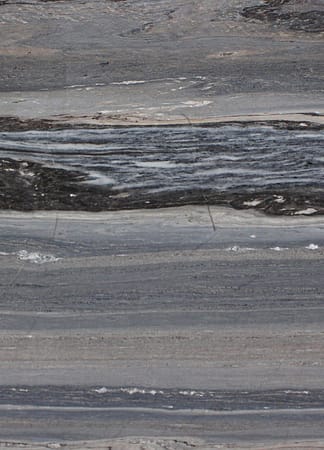 Close-up of gray and black marble texture.