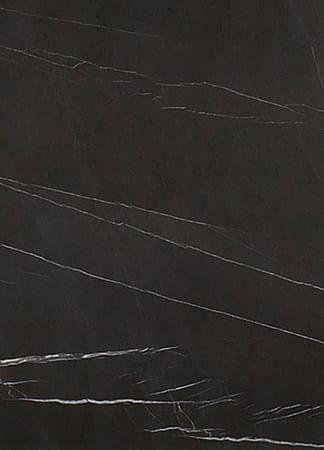 Dark marble surface with fine white veins.