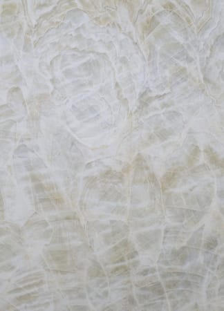 Close-up of textured alabaster stone surface.