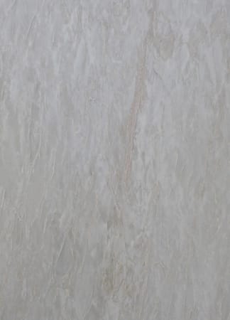 Close-up of light gray marble texture.