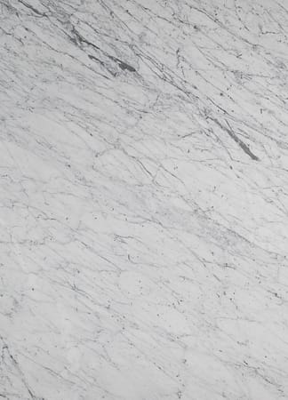 White marble texture with gray veins.